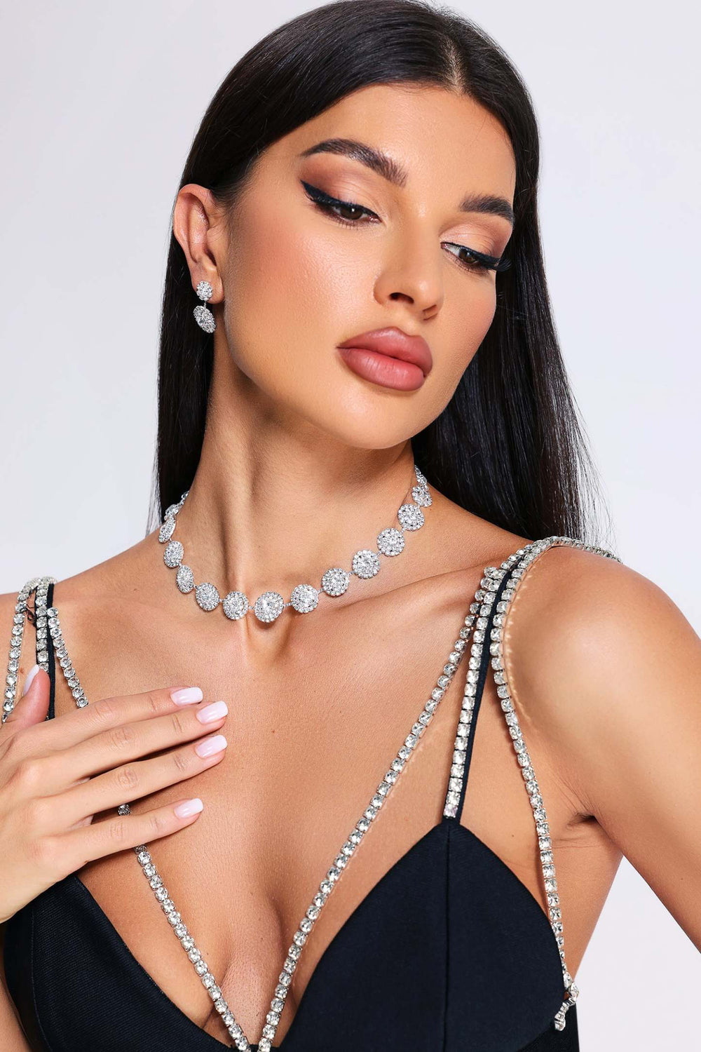 Silver necklace and earrings set with variable color tones