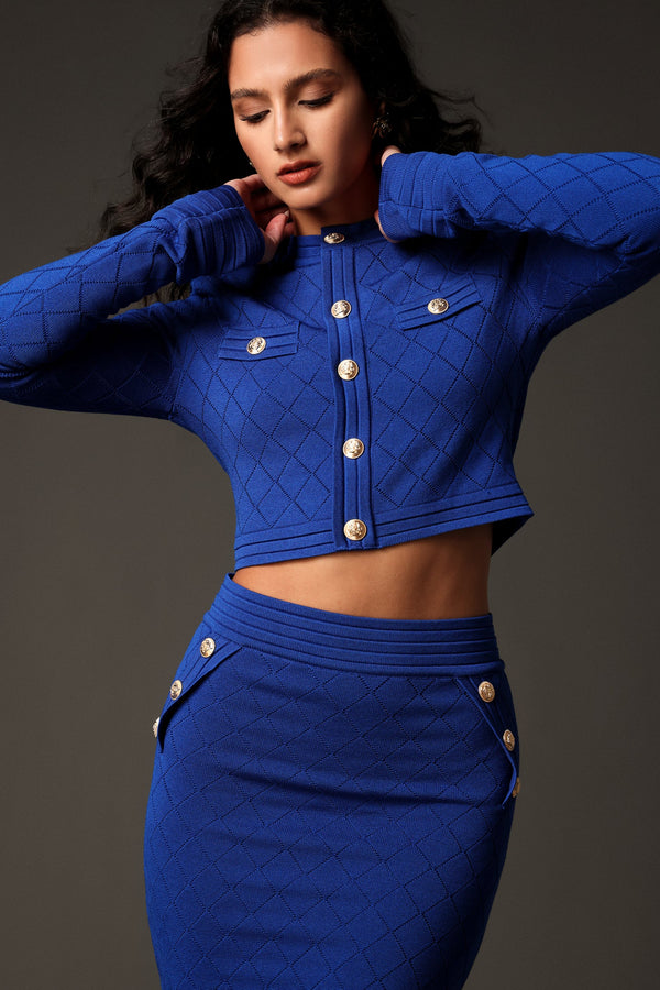 Ice-blue two-piece suit with metal buckles