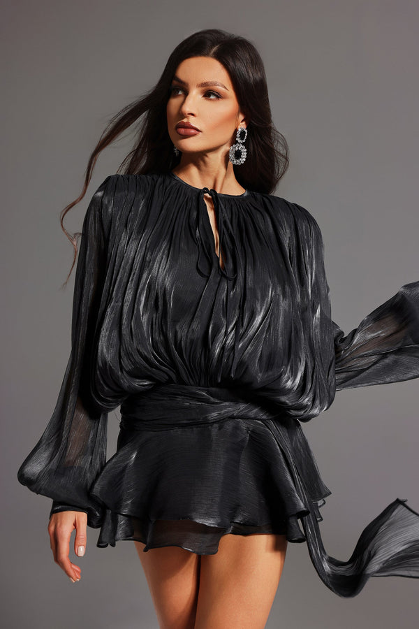 Black mini dress with three quarter sleeves and deep V-neckline