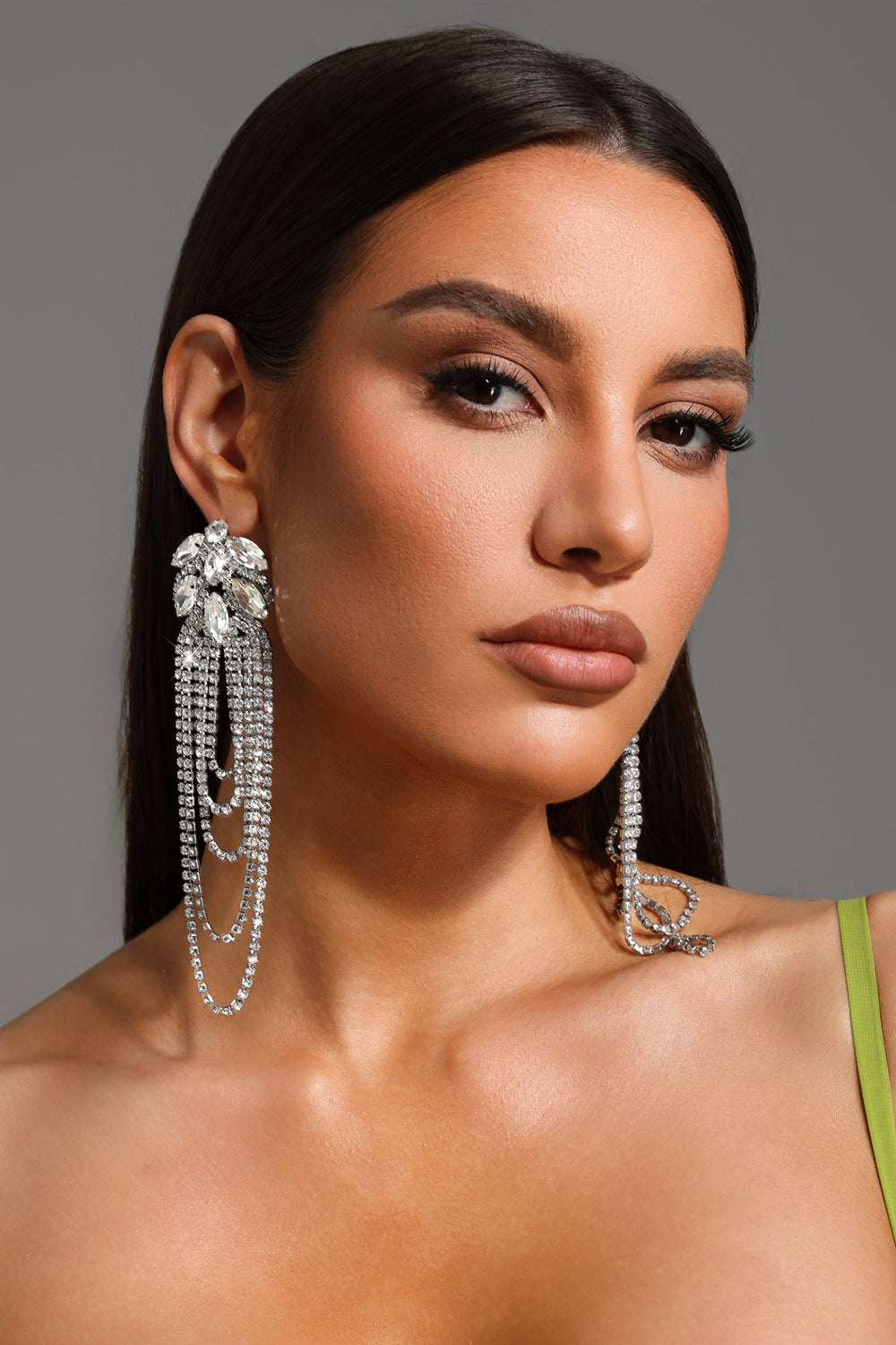 Silver Glenora earrings with gemstone details and tassel design