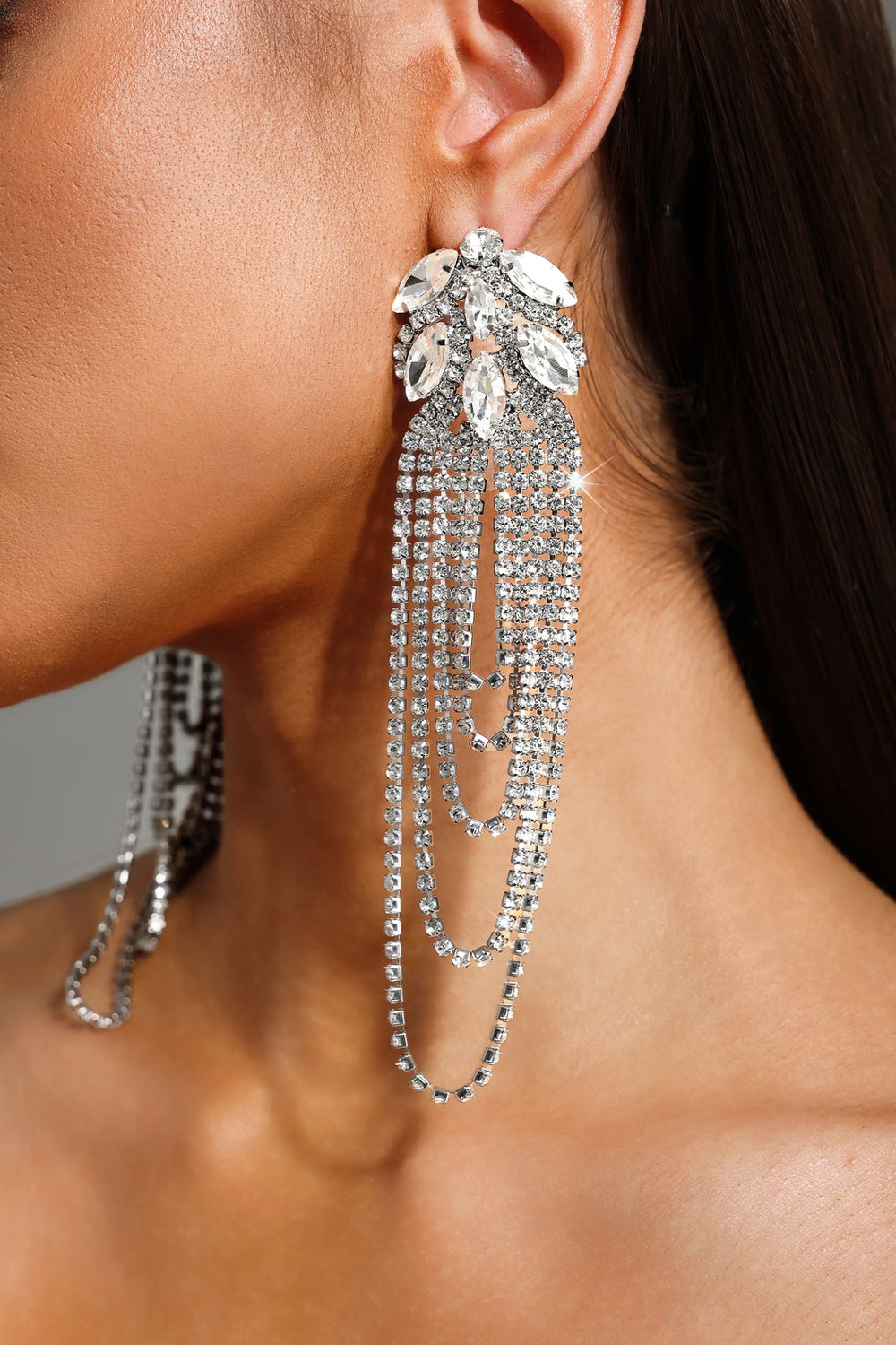 Silver Glenora earrings with gemstone details and tassel design