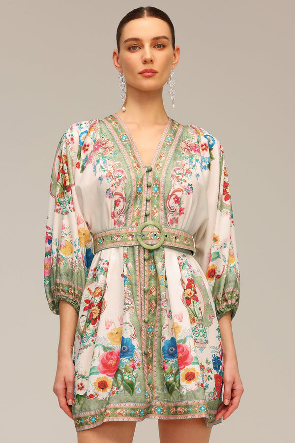 V-neck mini dress with floral pattern in pastel colors