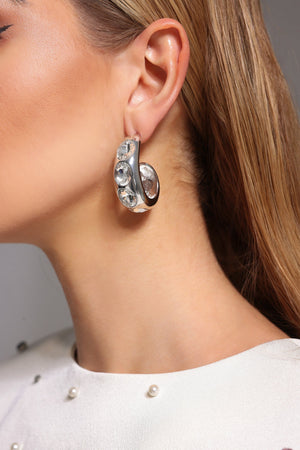 Elips şeklinde, taş detaylı Tatum küpeler.