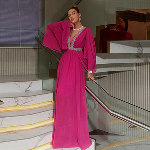 Uzun kollu V-yaka Tryphosa maxi elbise, zarif siyah tasarım