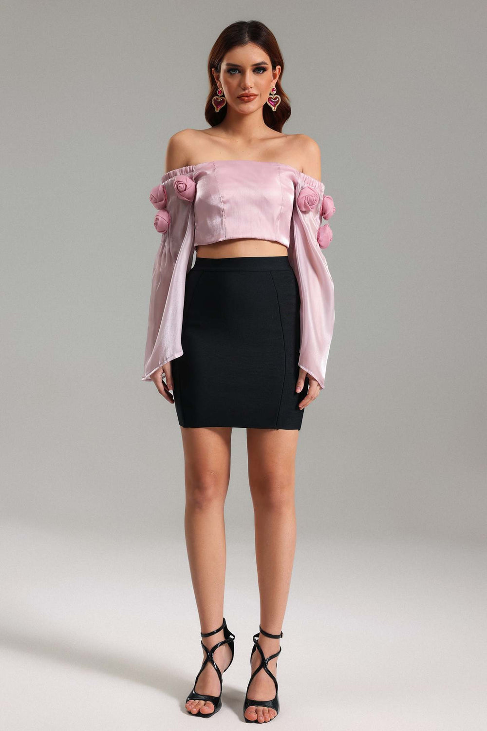 Off-shoulder short top with fabric composition of polyester, machine washable.