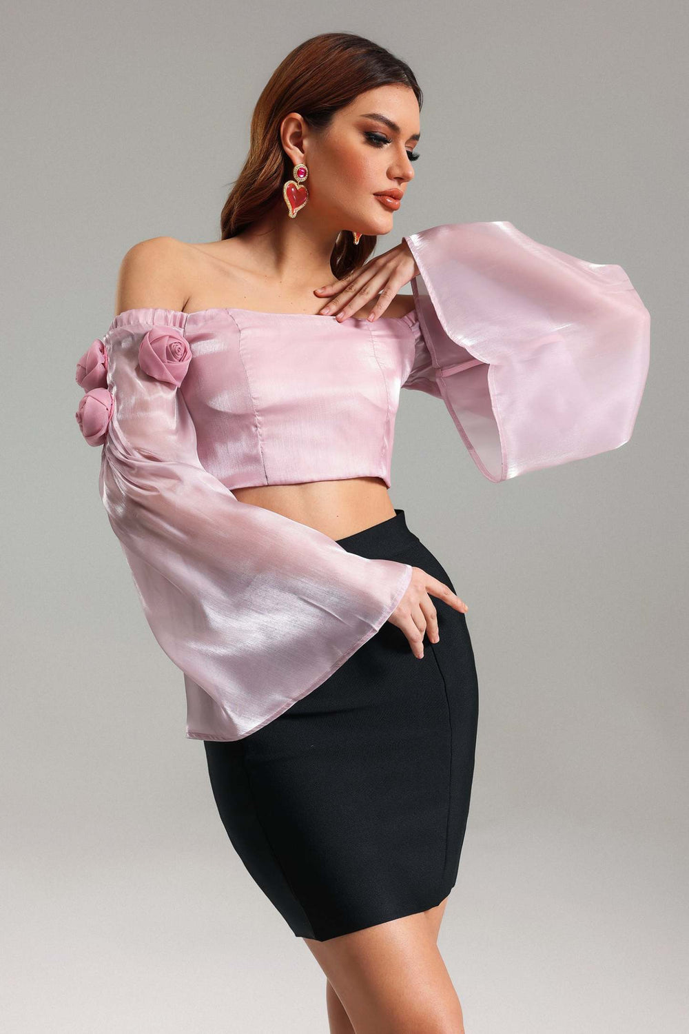 Off-shoulder short top with fabric composition of polyester, machine washable.