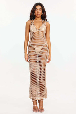 Örgü askılı Inbar elbise, %100 akrilik fiber malzemeden yapılmış.