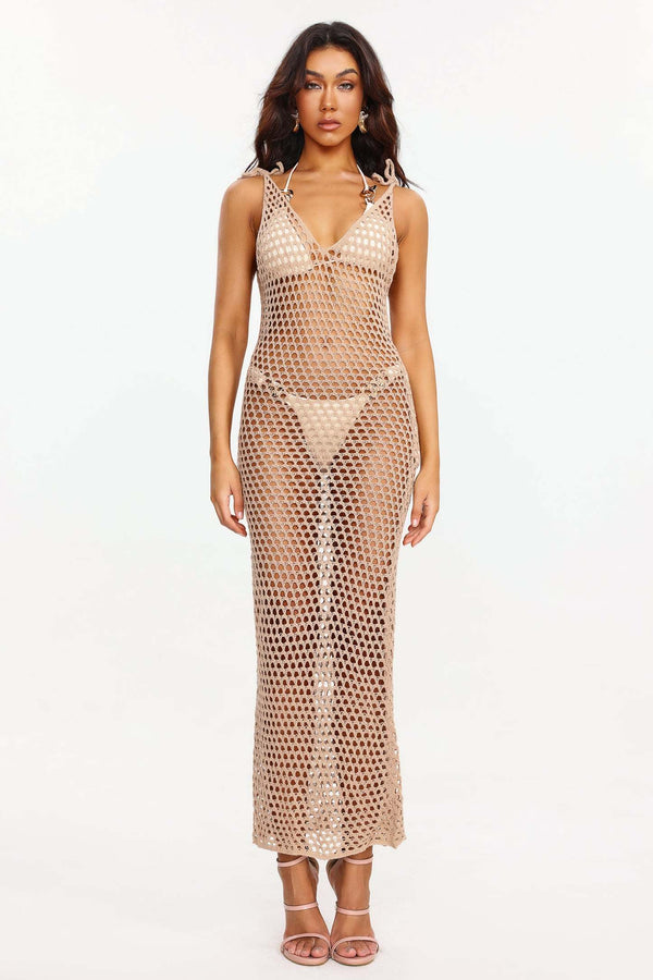 Örgü askılı Inbar elbise, %100 akrilik fiber malzemeden yapılmış.