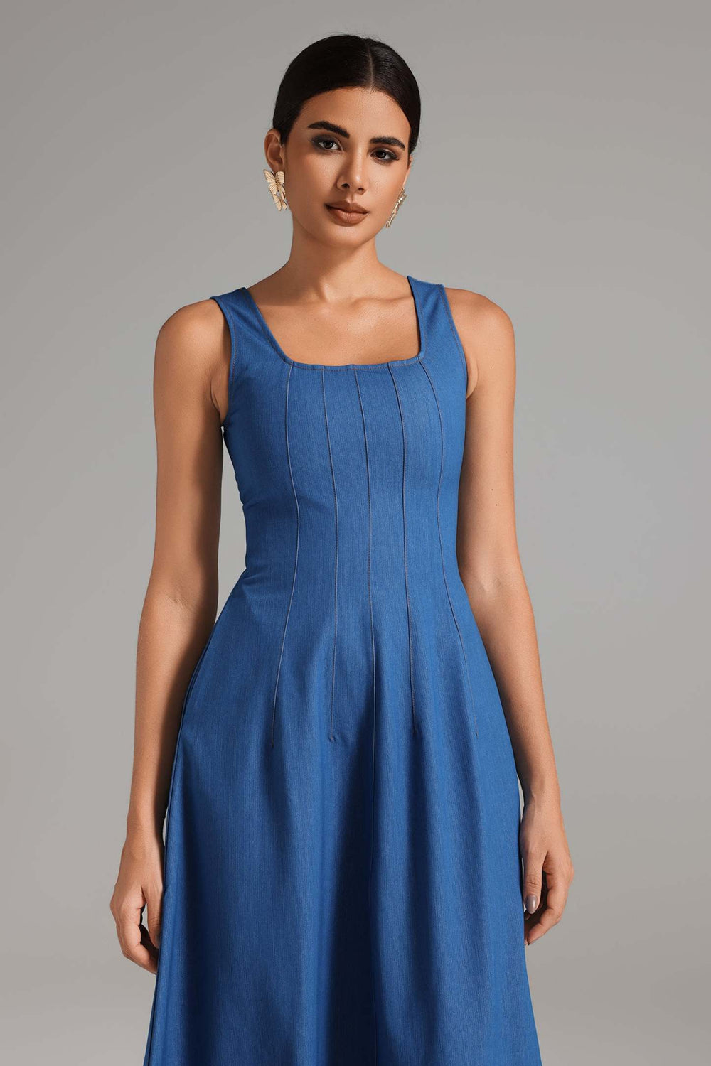 Cotton denim dress with adjustable straps in blue color