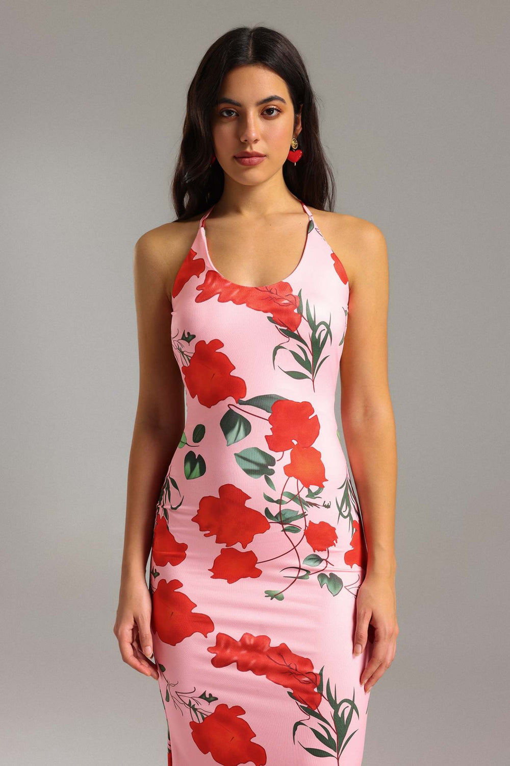 Pembe halter yaka baskılı polyester elbise.