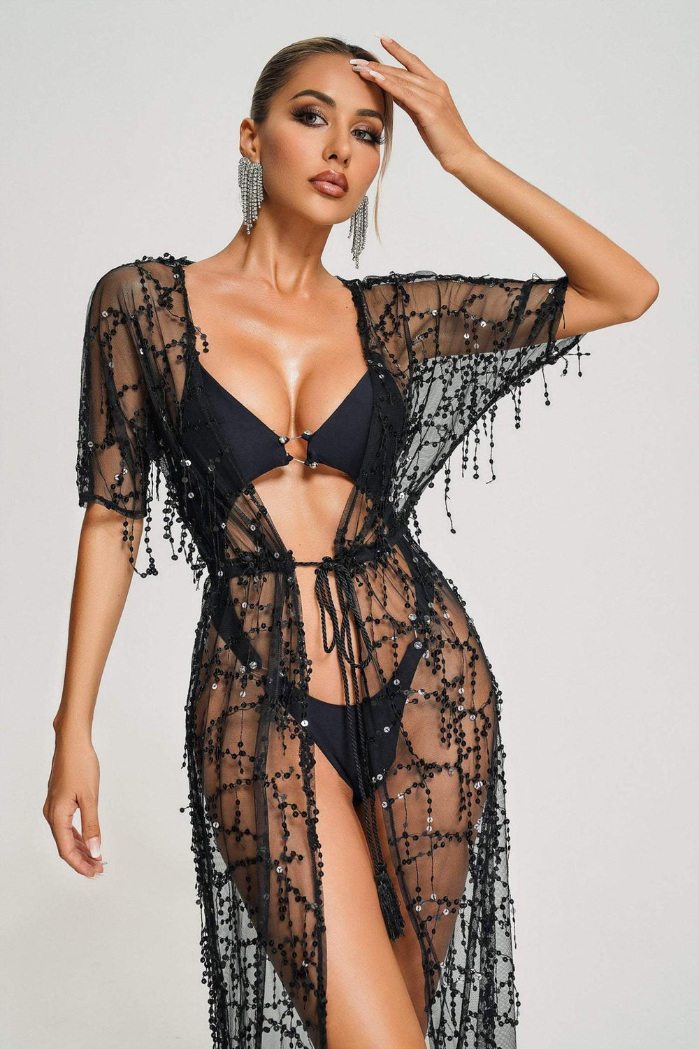 Sheer Dyani beach cover with glitter details and lightweight fabric