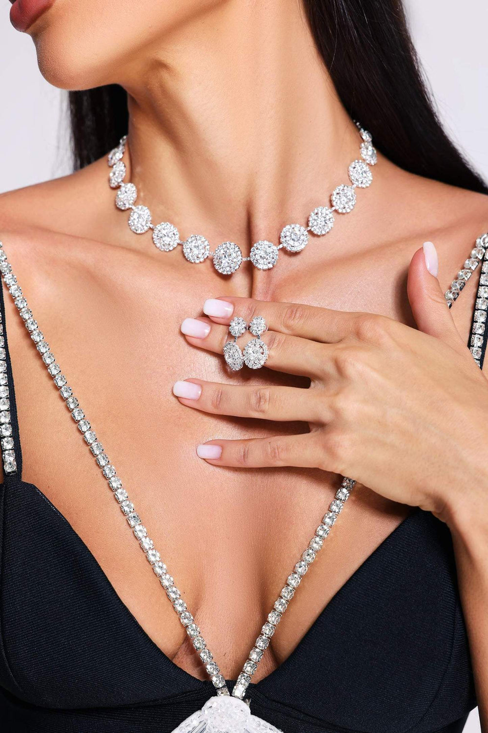 Silver necklace and earrings set with variable color tones