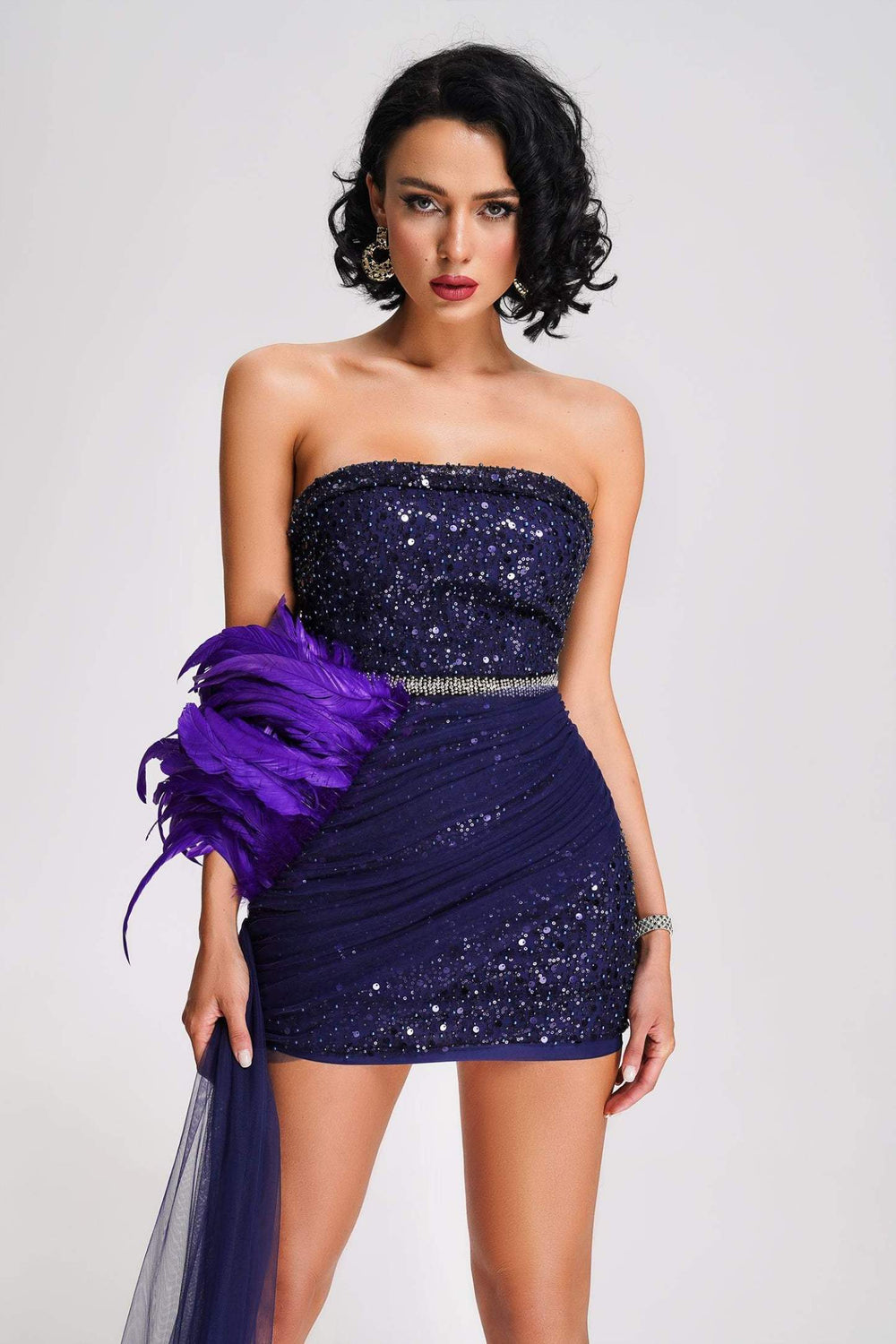 Black polyester dress with hand wash or dry clean care instructions