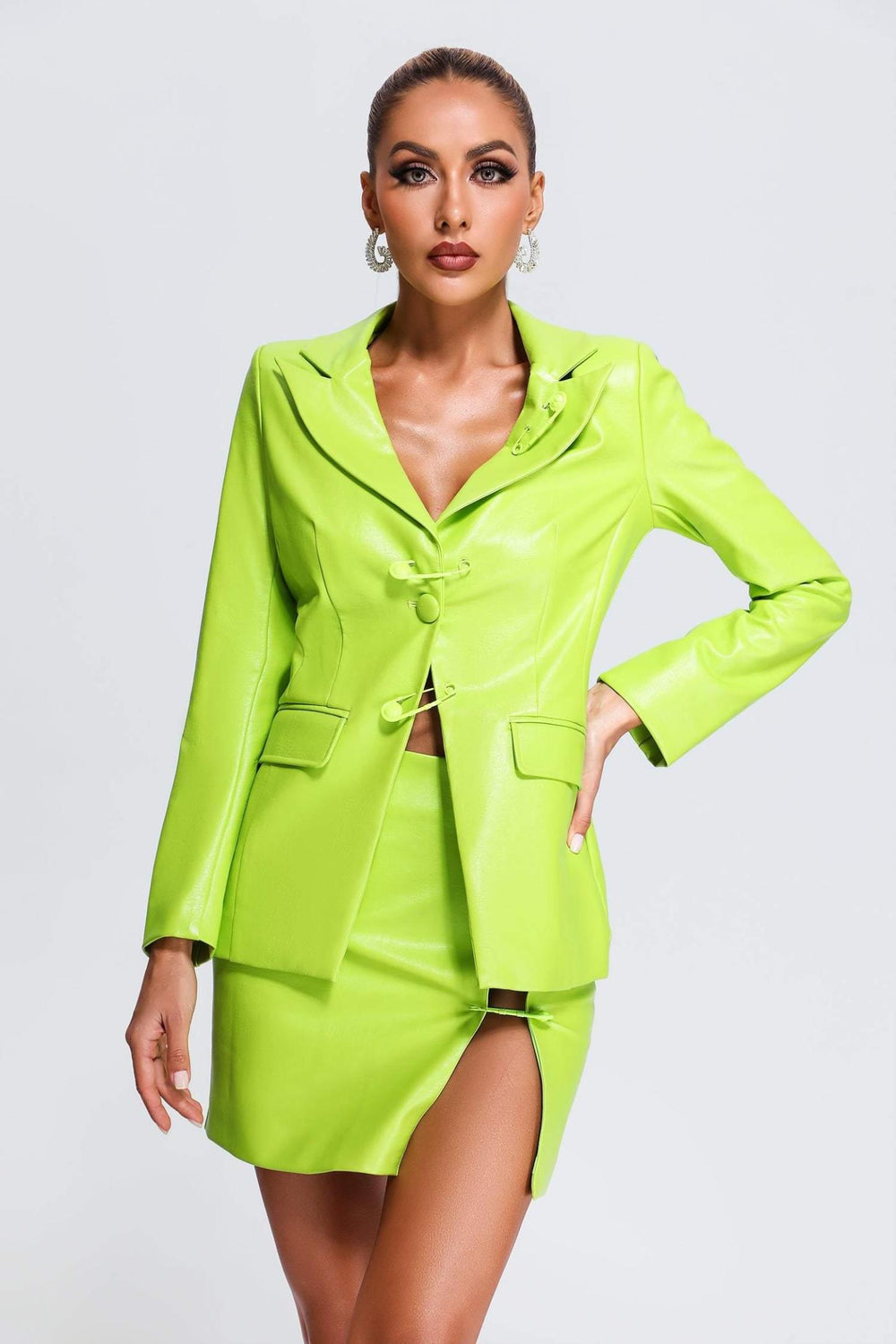 Bright green leather blazer set with high waisted mini skirt and side slit