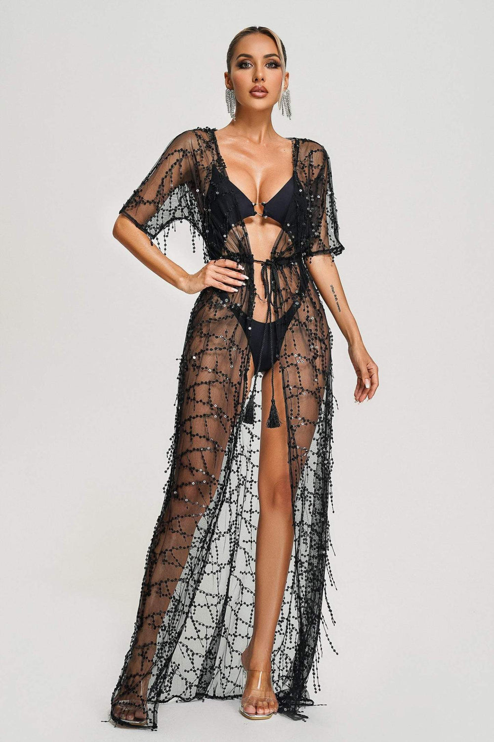 Sheer Dyani beach cover with glitter details and lightweight fabric