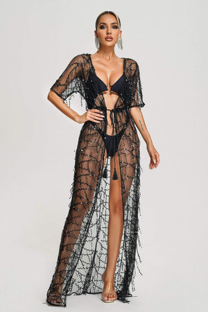 Sheer Dyani beach cover with glitter details and lightweight fabric