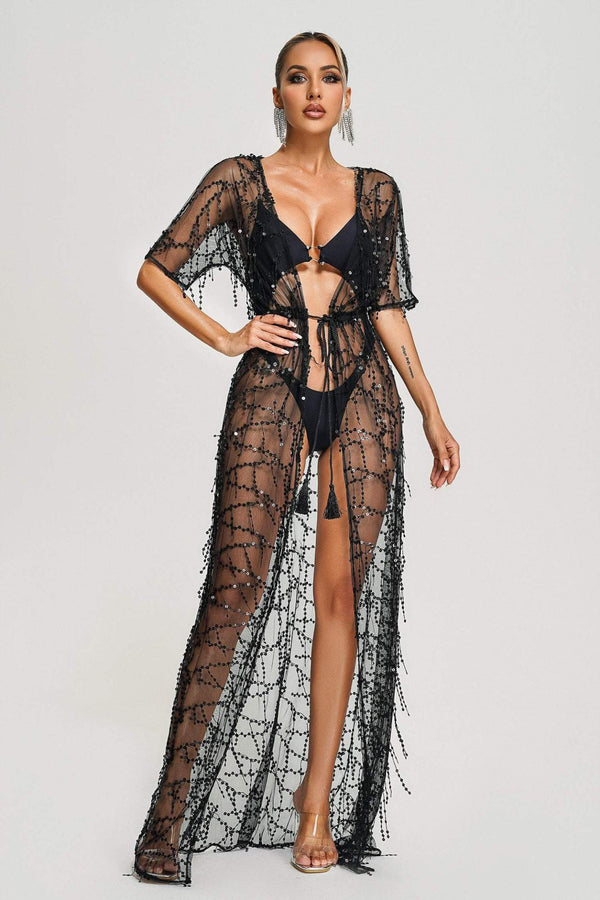 Sheer Dyani beach cover with glitter details and lightweight fabric