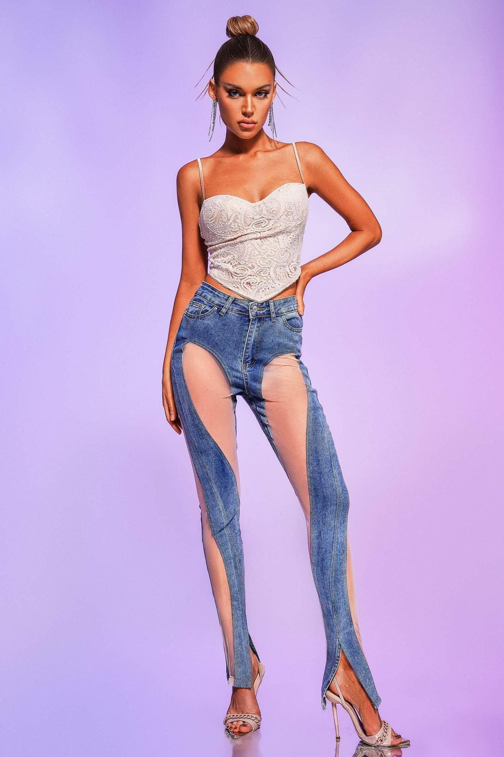 Reye Lace Top with elegant lace detailing and a semi-sheer finish.